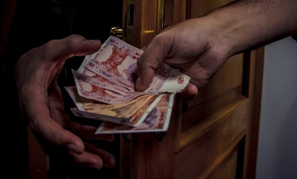 Un italian a fost reţinut de CNA pentru tentativă de trafic de influenţă asupra unor judecători